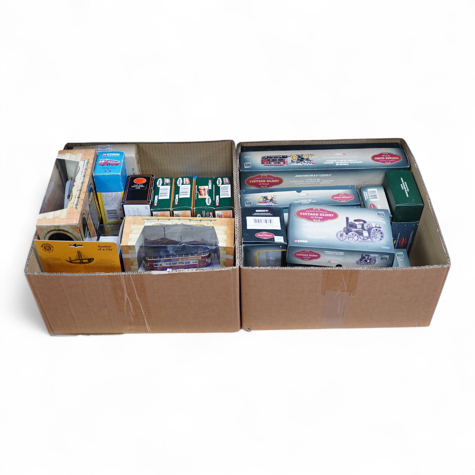 Twenty-three boxed Corgi diecast vehicles, including nine ‘Vintage Glory of Steam’ series, comprising of Showman’s engines, traction engines, steam road rollers, etc., together with ten trams including some from the ‘Tra
